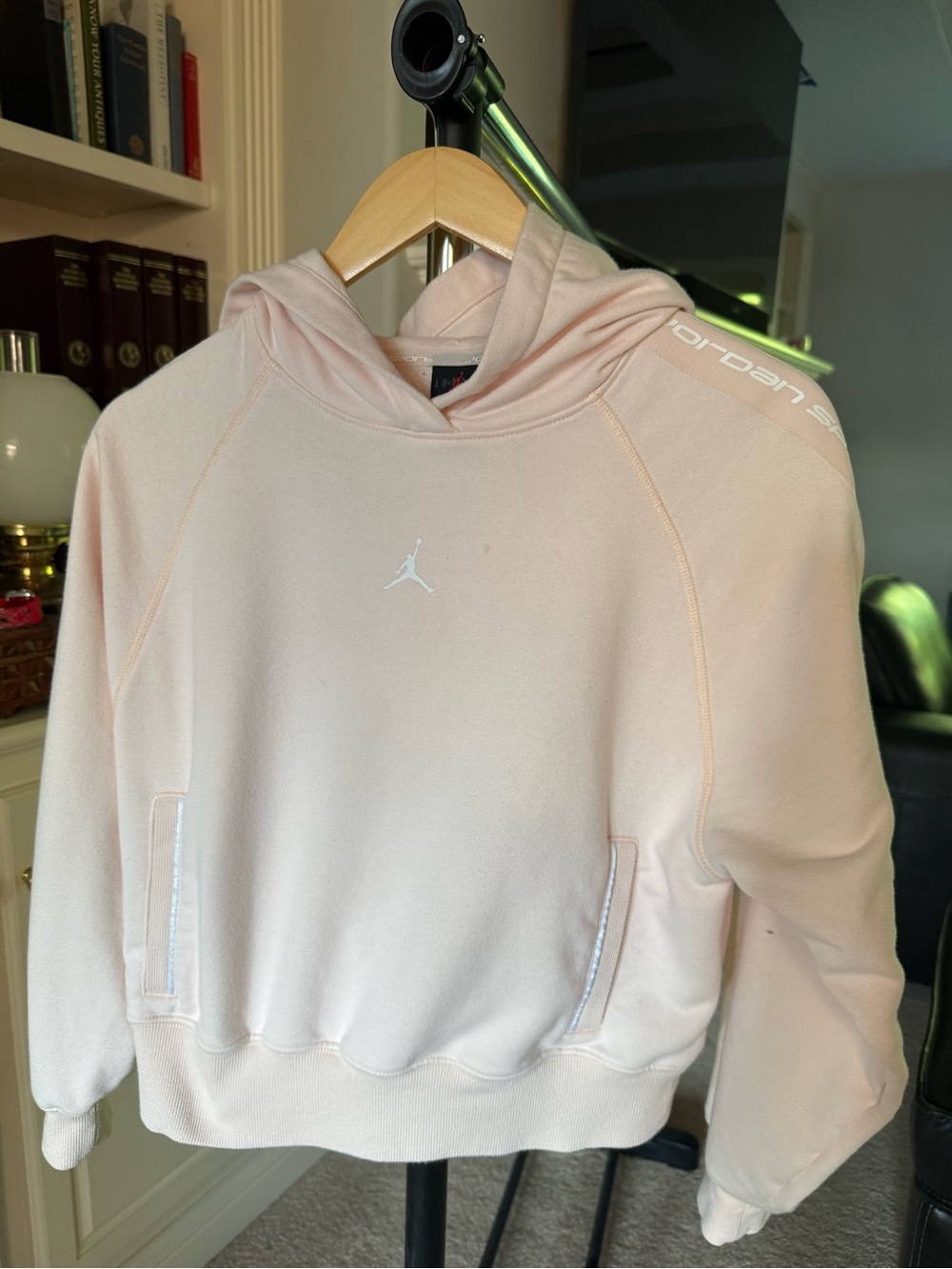 Light pink Jordan cropped pullover hoodie